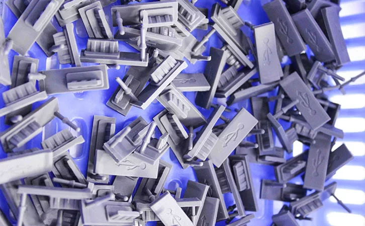 What is the core function of liquid silicone USB plugs in consumer electronics?