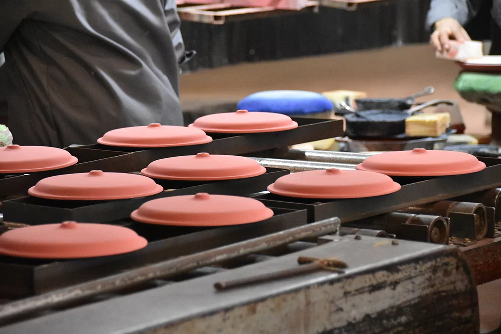 is enameled cast iron better than cast iron