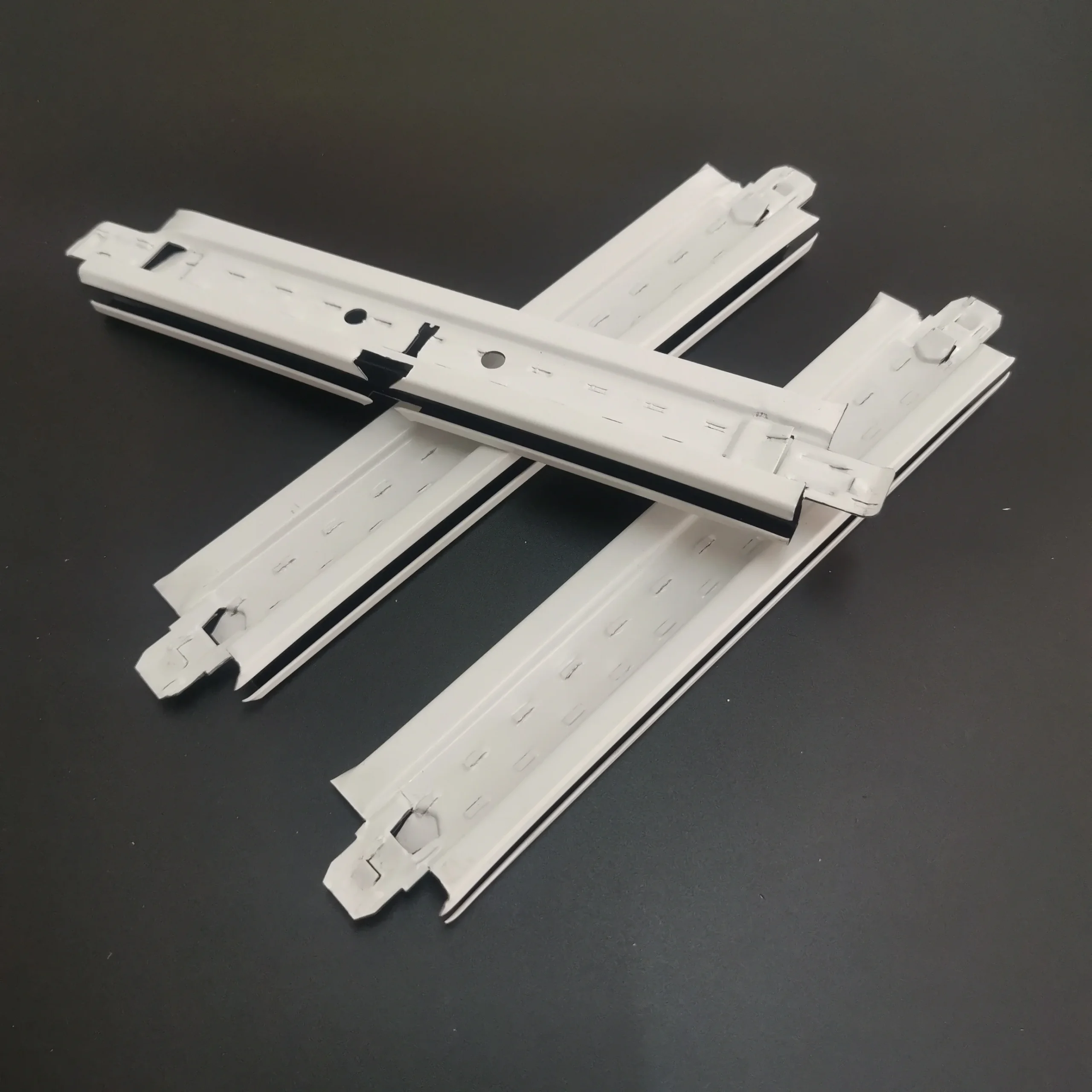 Ultra line/Silhoutted suspended ceiling grid types T15x38