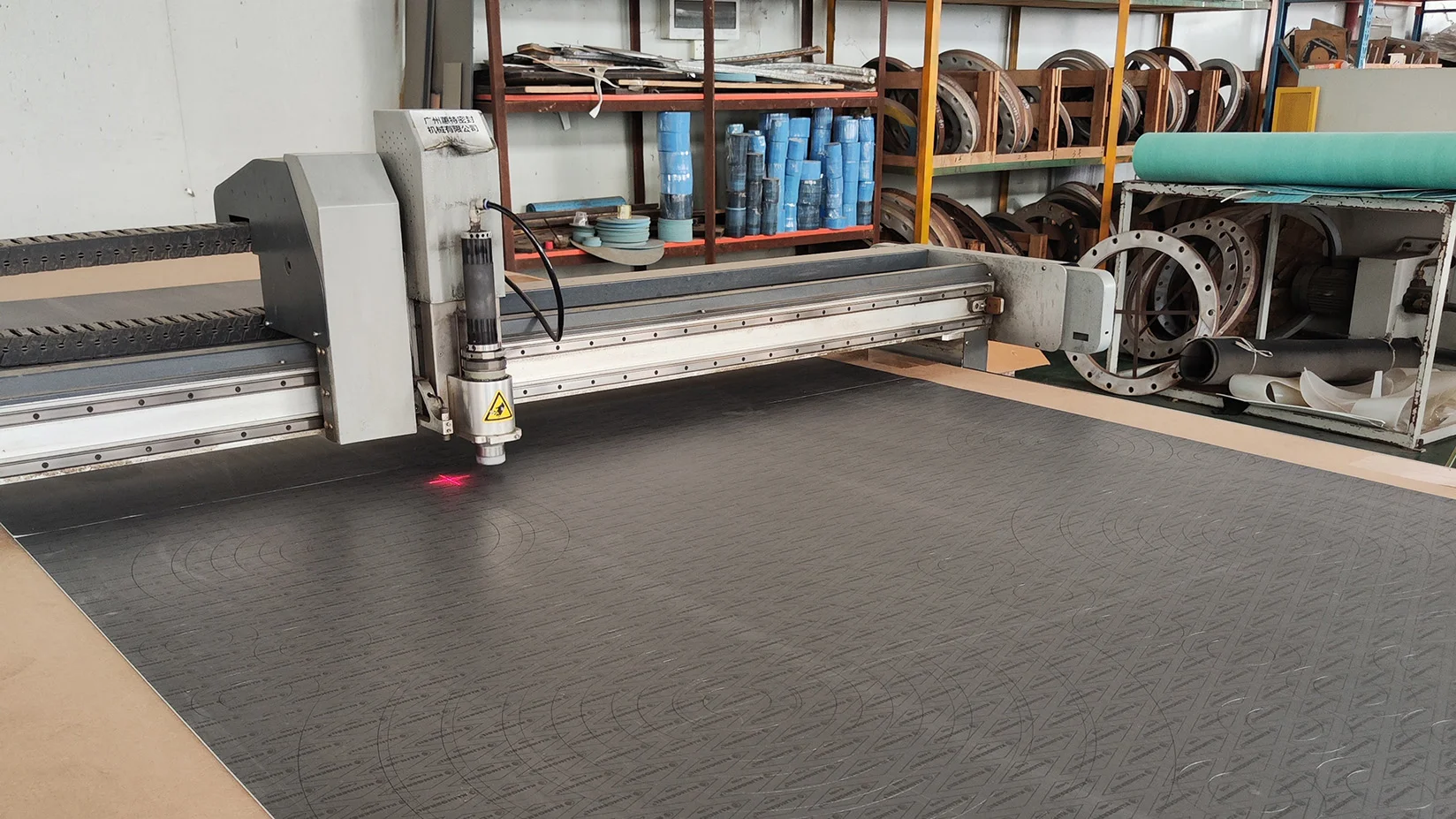 Non-asbestos gasket manufacturing - Cutting the non-asbestos sheet to gaskets (in this picture is Klingersil C-4500 )